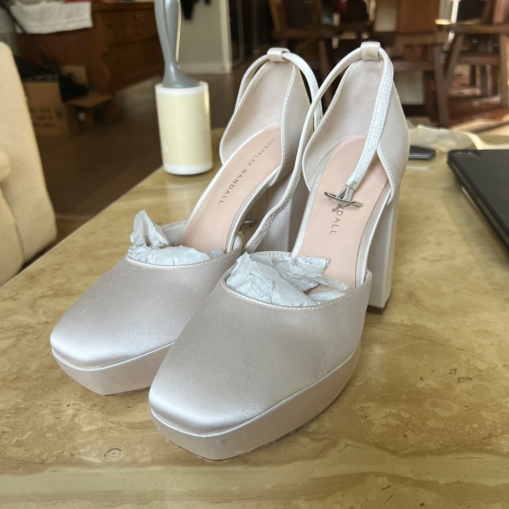 Loeffler Randall Selina Cream Closed-Toe Platform heels.